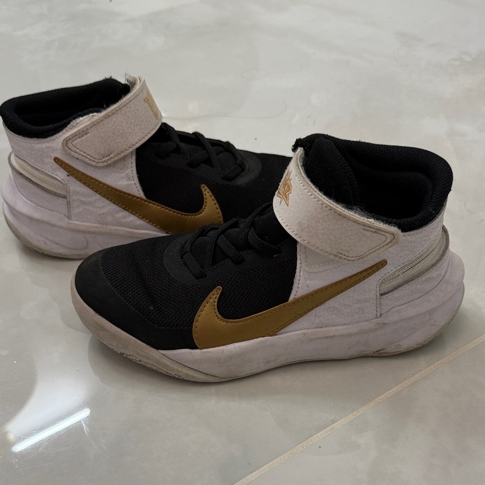 Nike Kids Black and Gold Mid-Top Sneakers